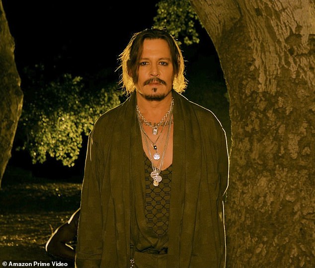 Signature look: The Donnie Brasco actor, 59, made his one-minute appearance midway through the show, sporting a layer of his signature necklaces and Savage pajamas